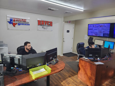 Two team members of the Rayco family in the office